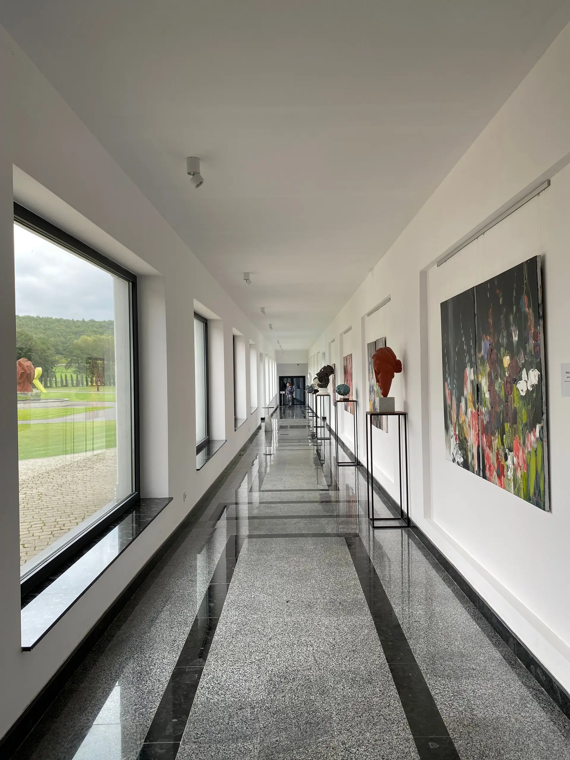 Contemporary gallery interior with minimalist sculptures